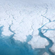 Meltwater forms on top of the Greenland ice sheet in the summer. Some of it might percolate down to recharge subglacial lakes.